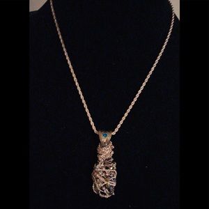 Simulated Wrapped Gold Cluster with a Rope Chain